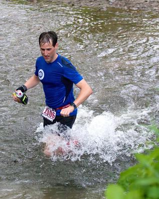Wading through a stream crossing at Cayuga Trails 50 Wading through a stream crossing at Cayuga Trails 50
